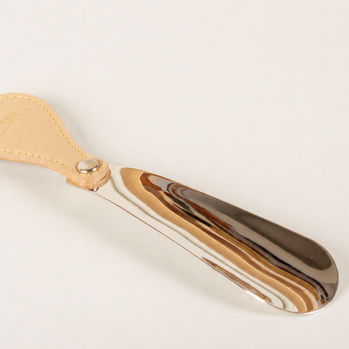 Saphir Médaille d'Or schoenlepel leer met metaal